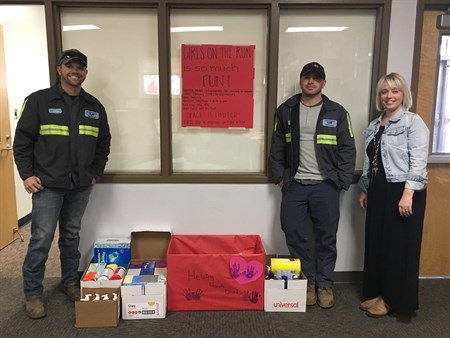 H2GO Employees with Lincoln Elementary Employee on First Day of Helping Hands Drive